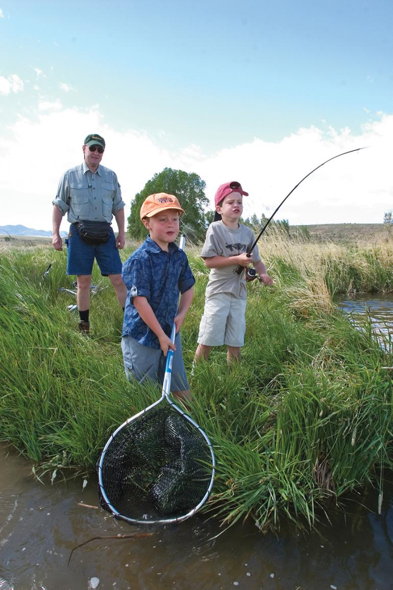 Photo by Denver Bryan kids fishing, learning to fish, nature, outside bozeman