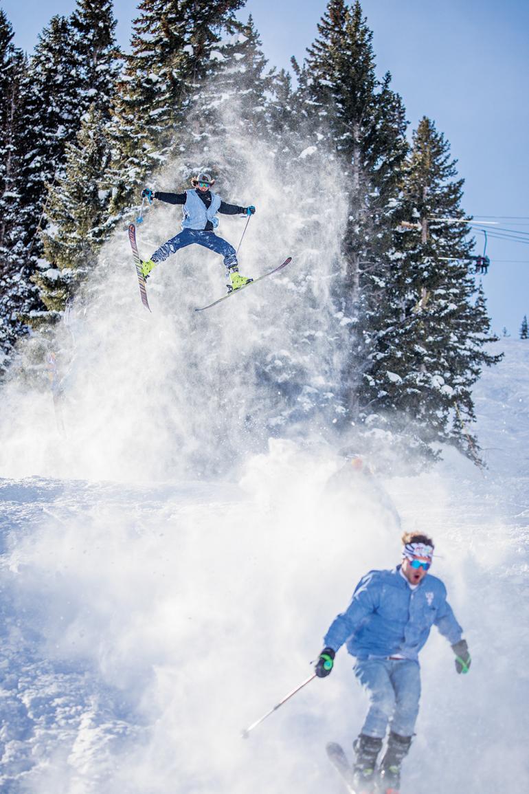 photo by John Howland skiing, jeans, denim